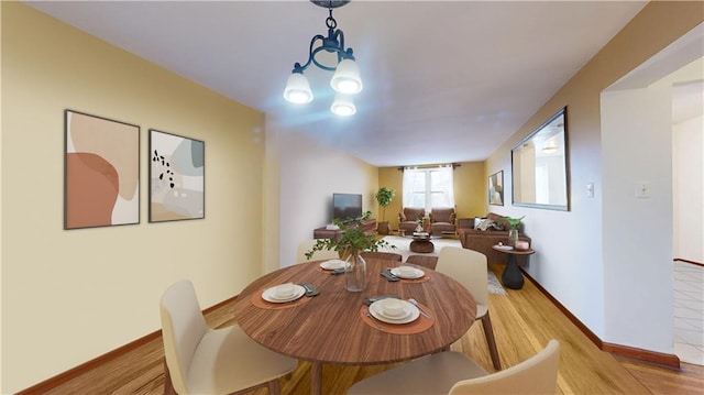 dining area with light wood-type flooring