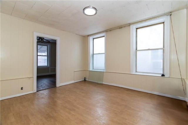 spare room featuring light wood-type flooring