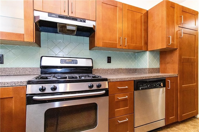 kitchen with appliances with stainless steel finishes and decorative backsplash