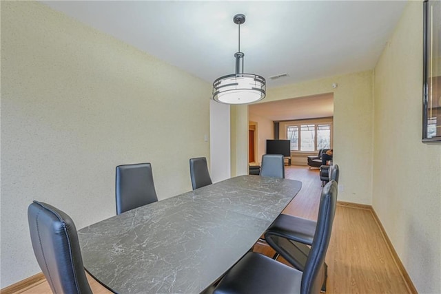 dining area featuring light hardwood / wood-style floors