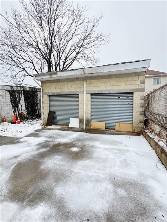 view of snow covered garage