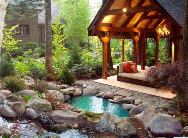 exterior space with a small pond