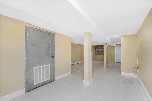 empty room featuring baseboards, visible vents, baseboard heating, and recessed lighting