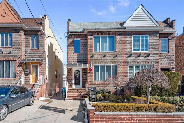 multi unit property featuring brick siding