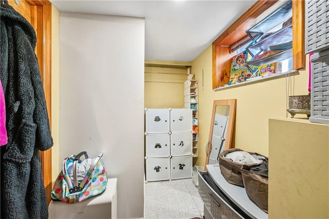 bedroom featuring speckled floor