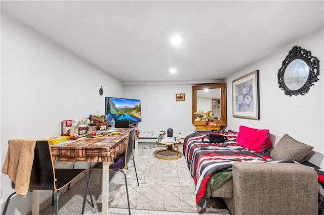 living room featuring recessed lighting and a baseboard radiator