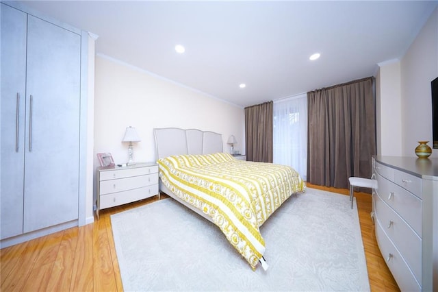 40 Oceana Dr W Unit 2G, Brooklyn, NY 11235 - bedroom with light wood finished floors, recessed lighting, and ornamental molding