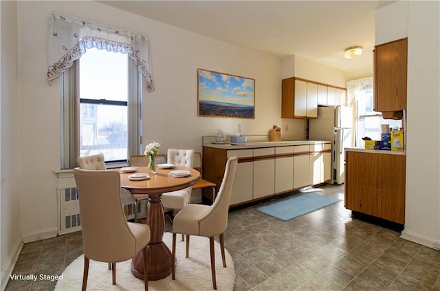 dining room with radiator