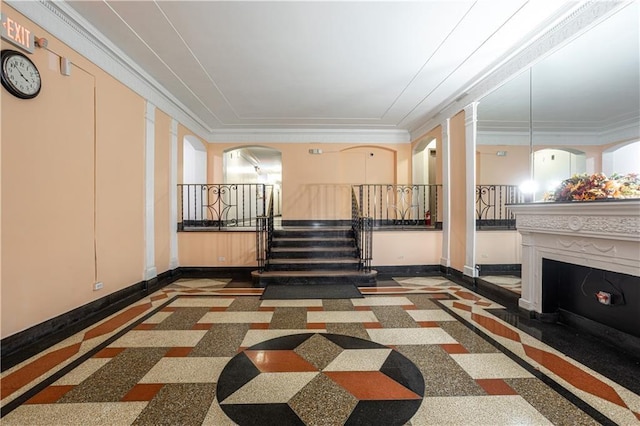 110 Shore Blvd Unit 4H, Brooklyn, NY 11235 - hall featuring stairway, ornate columns, baseboards, and ornamental molding