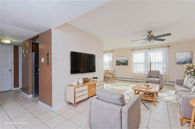 tiled living room with ceiling fan and a baseboard heating unit