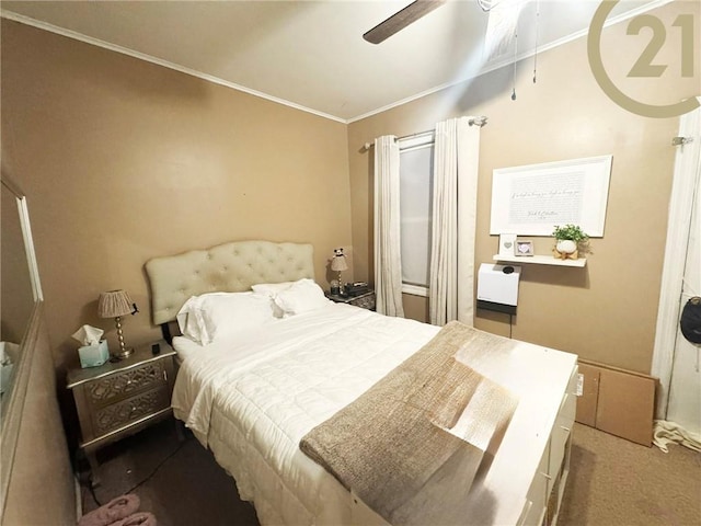 bedroom with carpet, a ceiling fan, and crown molding