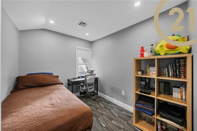 bedroom featuring vaulted ceiling