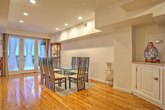 1740 W 4th St Unit 4C, Brooklyn, NY 11223 - dining space featuring recessed lighting, light wood-type flooring, and french doors