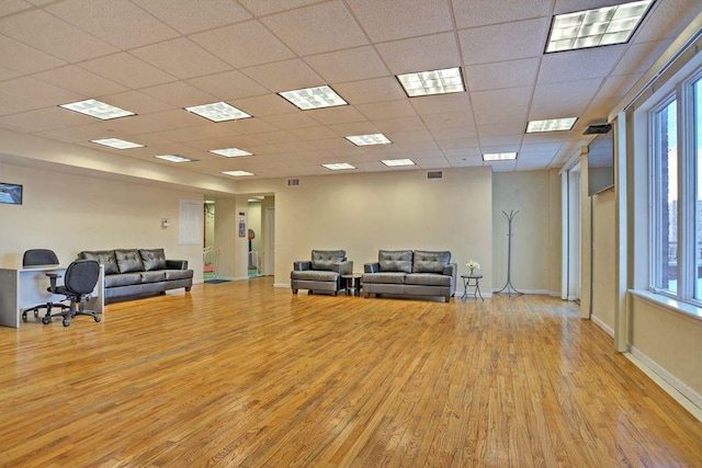 interior space featuring visible vents, plenty of natural light, and light wood finished floors