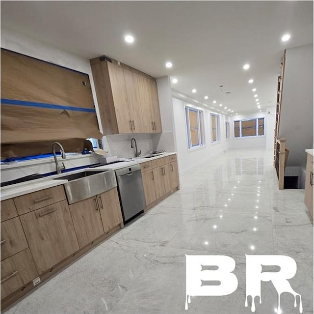 kitchen with marble finish floor, light countertops, and dishwasher