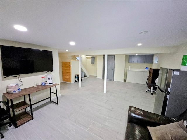 living area featuring stairway and recessed lighting