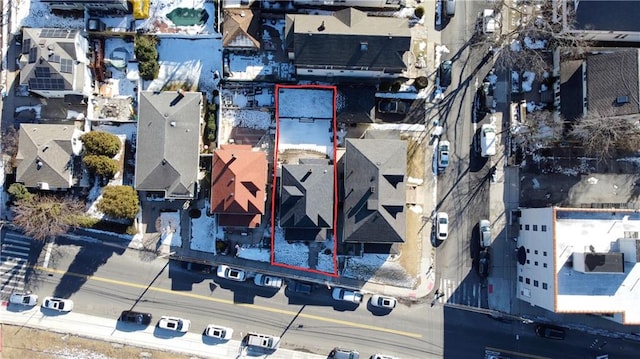 birds eye view of property with a residential view