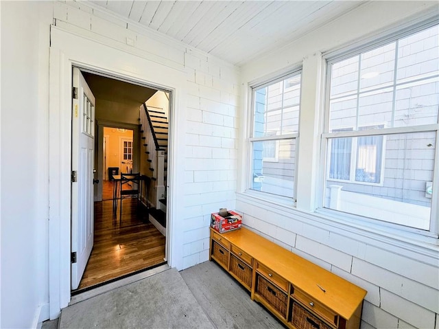 mudroom with concrete flooring