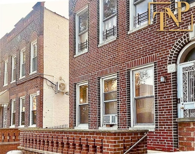 view of building exterior with ac unit