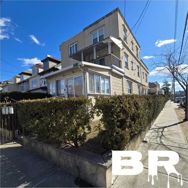 view of side of home with a residential view