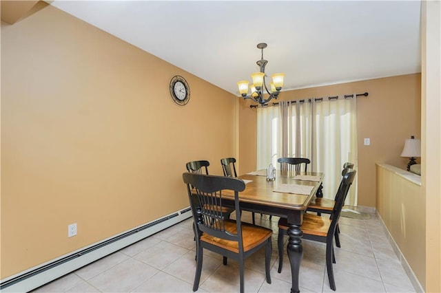 dining space with baseboard heating, a notable chandelier, and light tile patterned flooring