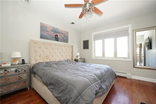 bedroom featuring baseboards, visible vents, a ceiling fan, dark wood-style floors, and a baseboard heating unit