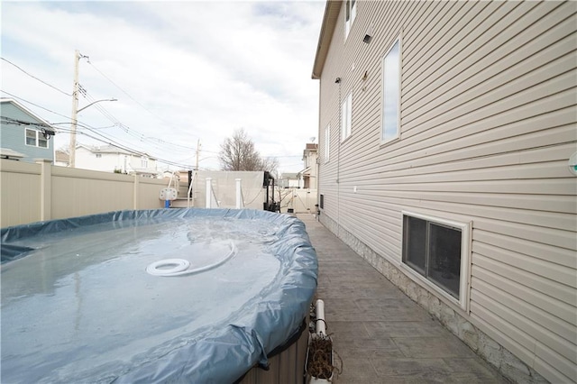 view of side of property with a fenced backyard