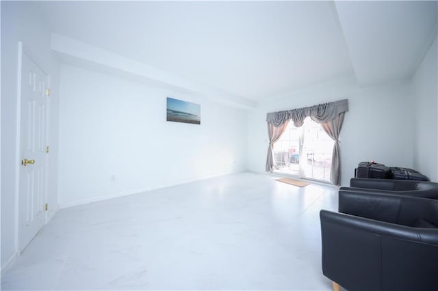 sitting room featuring baseboards