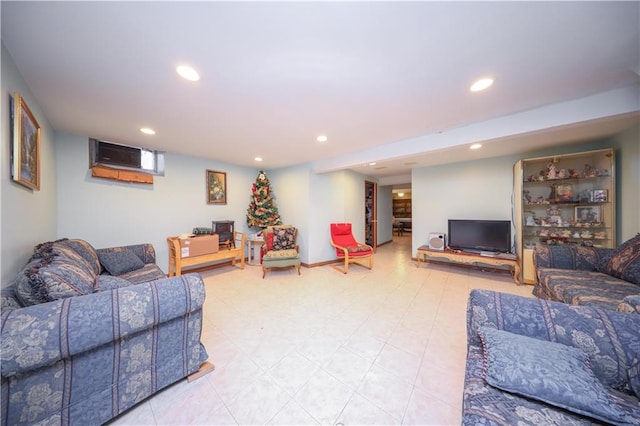 living room featuring a wall mounted air conditioner and recessed lighting