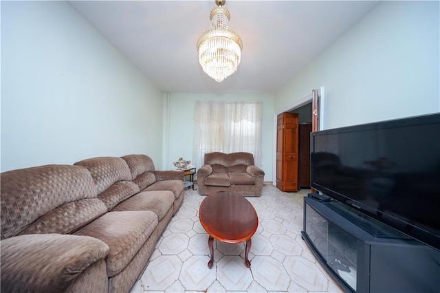 living room with a chandelier and vaulted ceiling