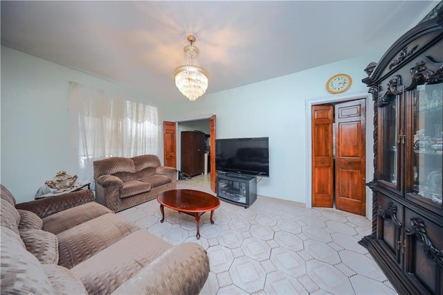 living area featuring a notable chandelier