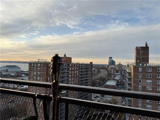 property's view of city featuring a water view