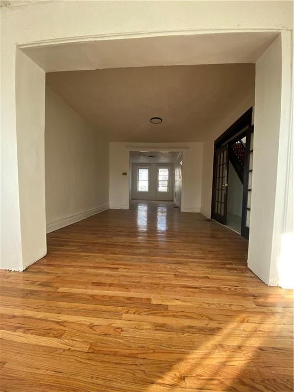 interior space featuring wood finished floors and french doors