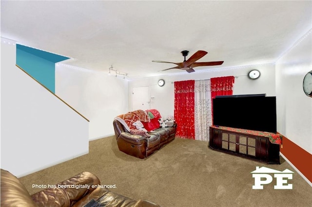 carpeted living room featuring rail lighting and a ceiling fan