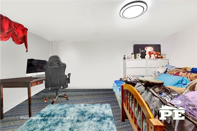 bedroom featuring carpet flooring and baseboards