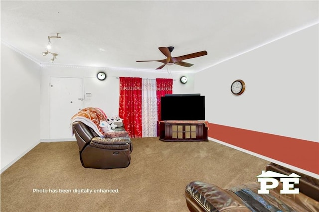 carpeted living room with ceiling fan