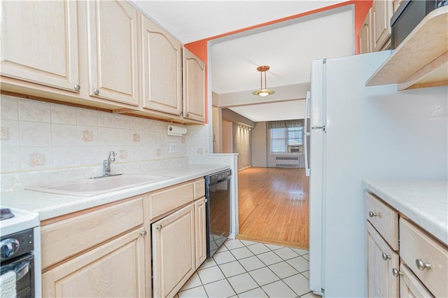 9707 4th Ave Unit 4W, Brooklyn, NY 11209 - kitchen featuring dishwasher, radiator heating unit, light brown cabinetry, light countertops, and decorative backsplash