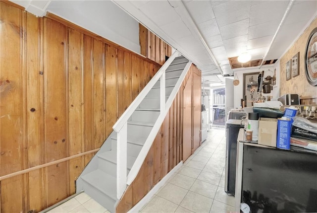 stairs with tile patterned flooring