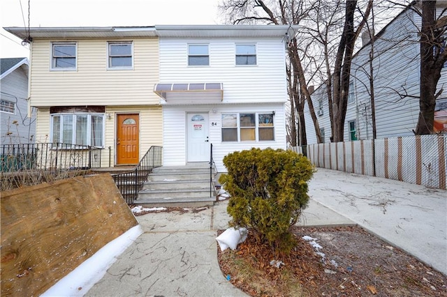 view of front of home with fence