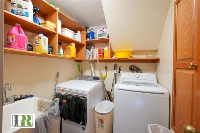 washroom featuring laundry area and washing machine and clothes dryer