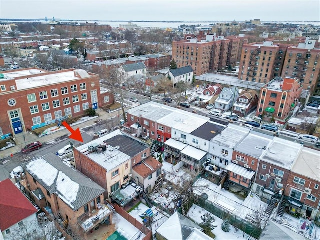 birds eye view of property featuring a city view