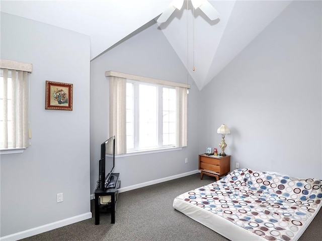 carpeted bedroom with vaulted ceiling, baseboards, and ceiling fan