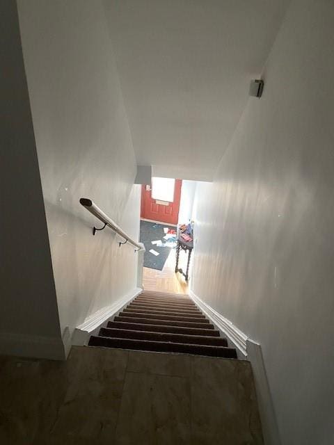 staircase with baseboards