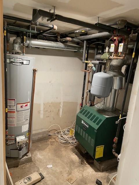 utilities with a heating unit and gas water heater