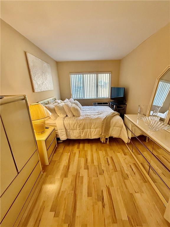 bedroom featuring light wood-type flooring