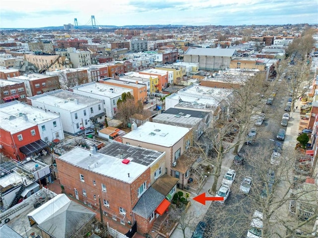 birds eye view of property featuring a city view