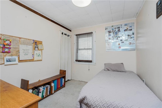 bedroom with carpet and ornamental molding