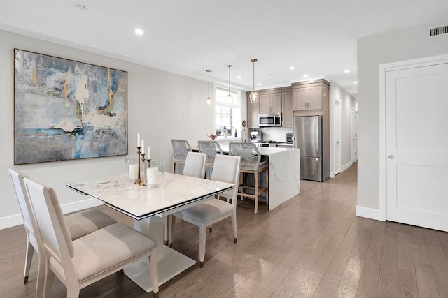 97 Battery Ave Unit 3B, Brooklyn, NY 11209 - dining room featuring light wood-type flooring, recessed lighting, and baseboards