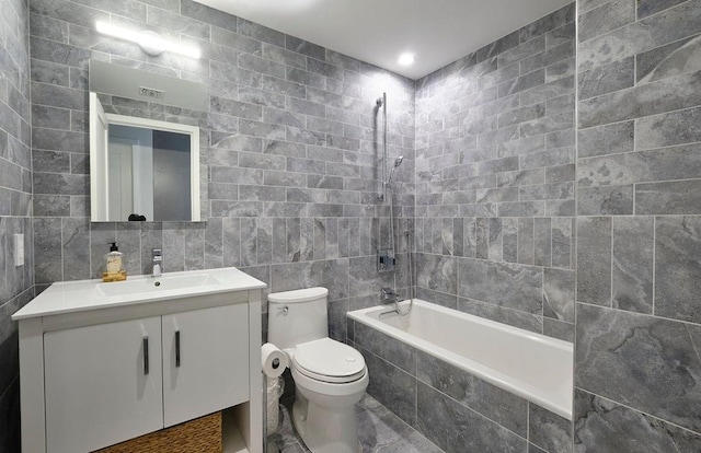 97 Battery Ave Unit 3B, Brooklyn, NY 11209 - bathroom featuring tile walls, tiled shower / bath combo, vanity, and toilet