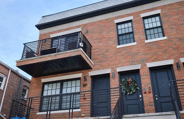 97 Battery Ave Unit 3B, Brooklyn, NY 11209 - view of front of home featuring a balcony and brick siding